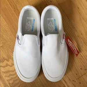 All white vans slip-ons